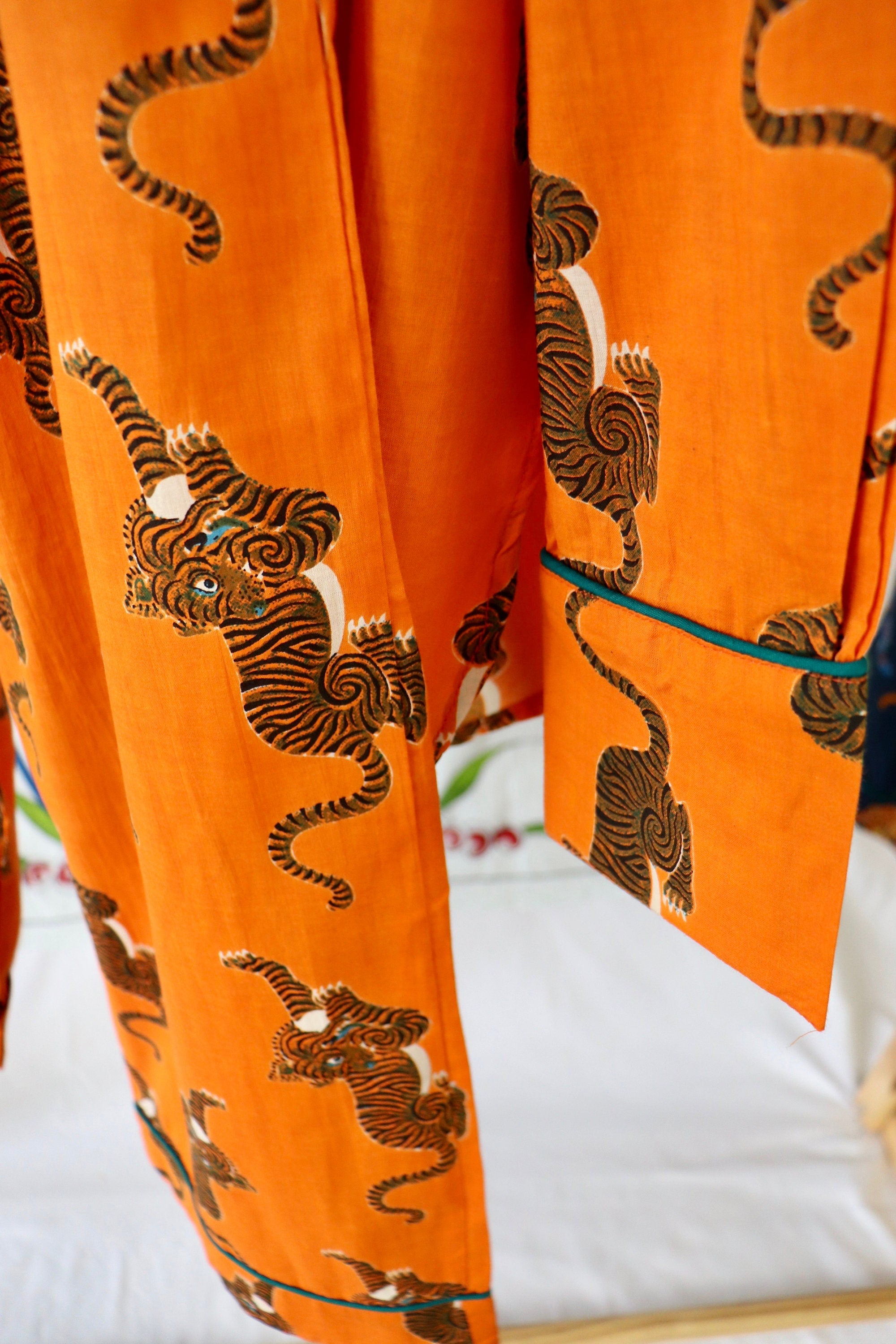 Pyjama set woman in pure cotton Tigers inspired print,  long pants and long sleeves with pockets and pipping on a Hermes Orange