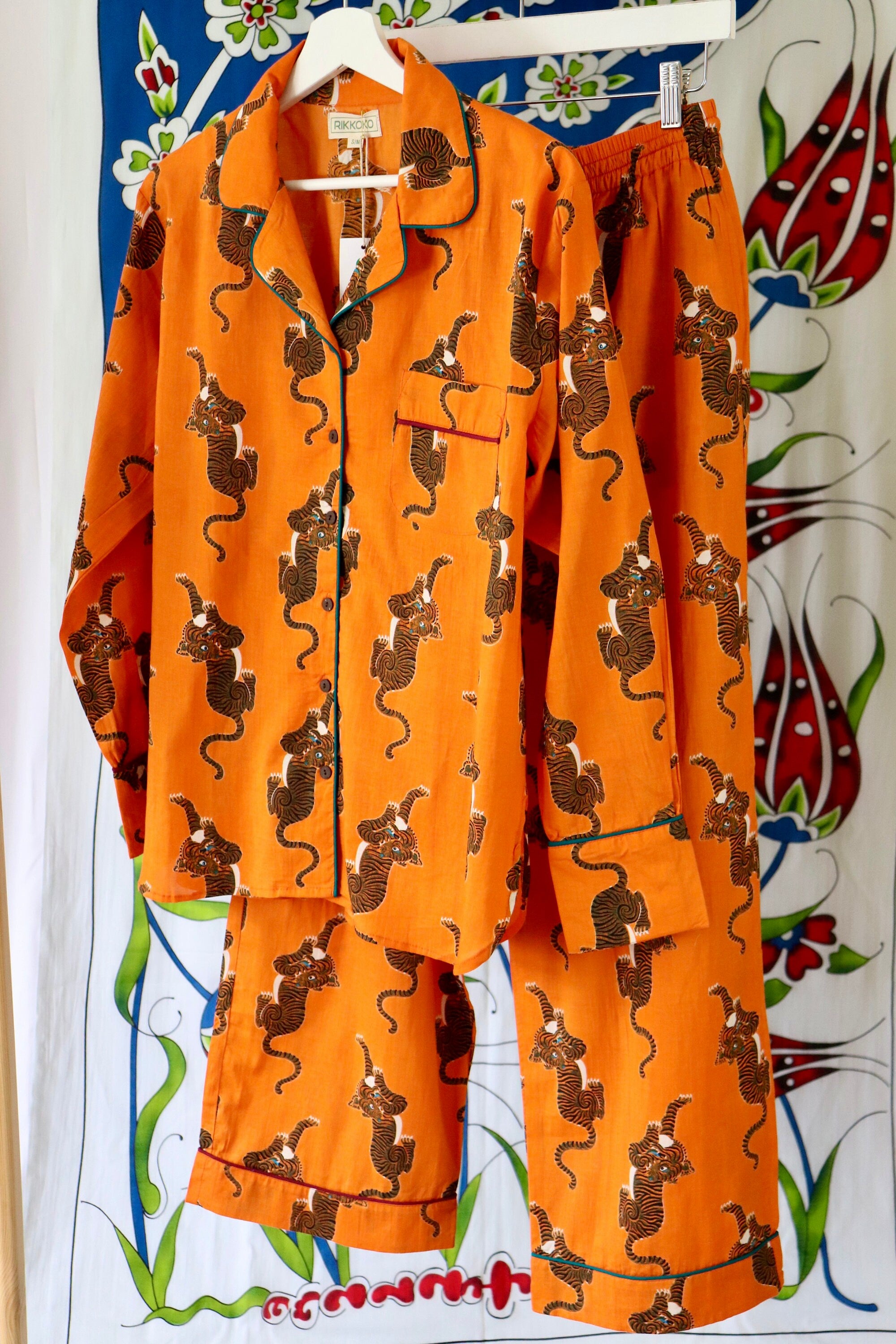 Pyjama set woman in pure cotton Tigers inspired print,  long pants and long sleeves with pockets and pipping on a Hermes Orange