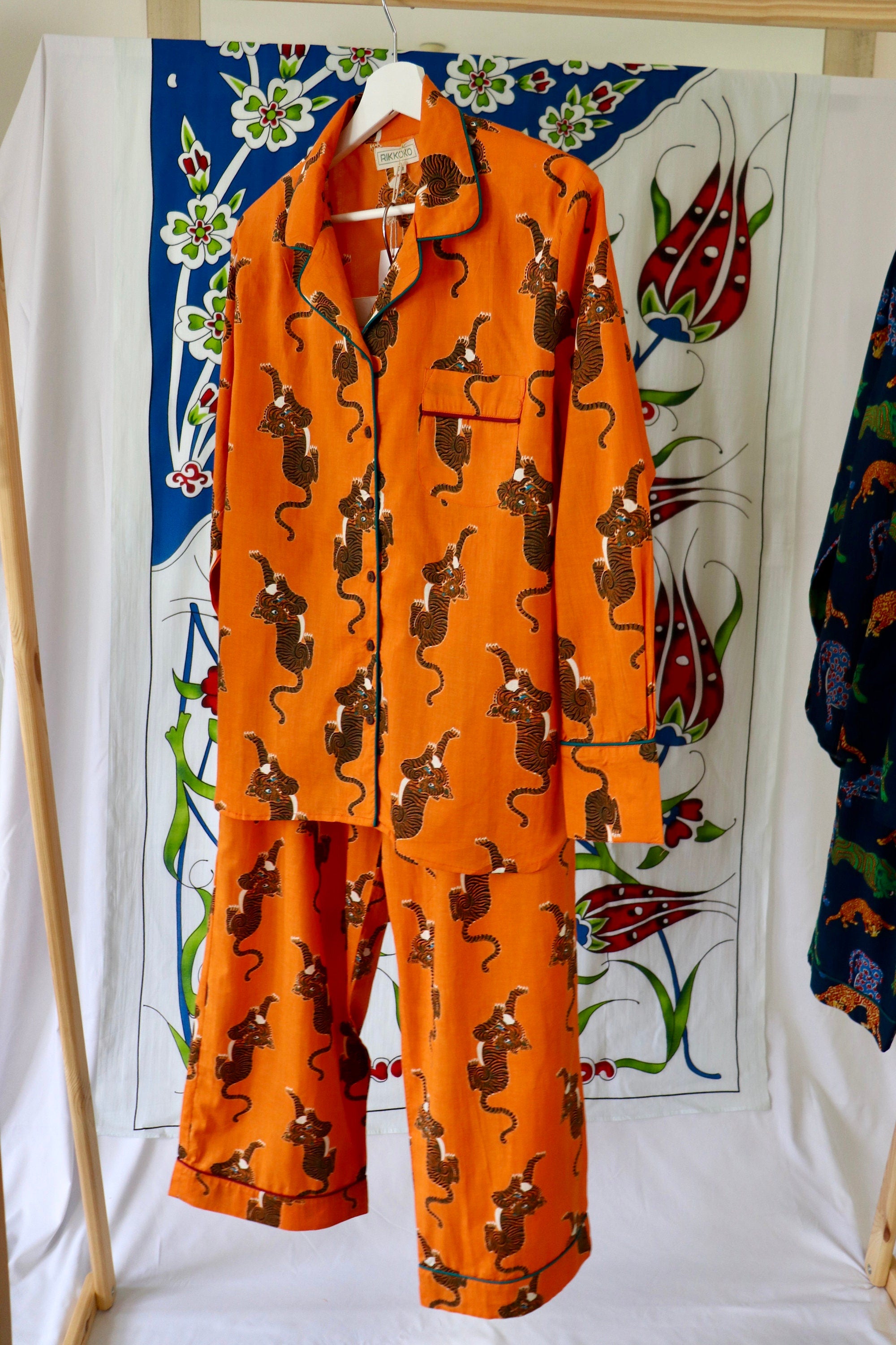 Pyjama set woman in pure cotton Tigers inspired print,  long pants and long sleeves with pockets and pipping on a Hermes Orange