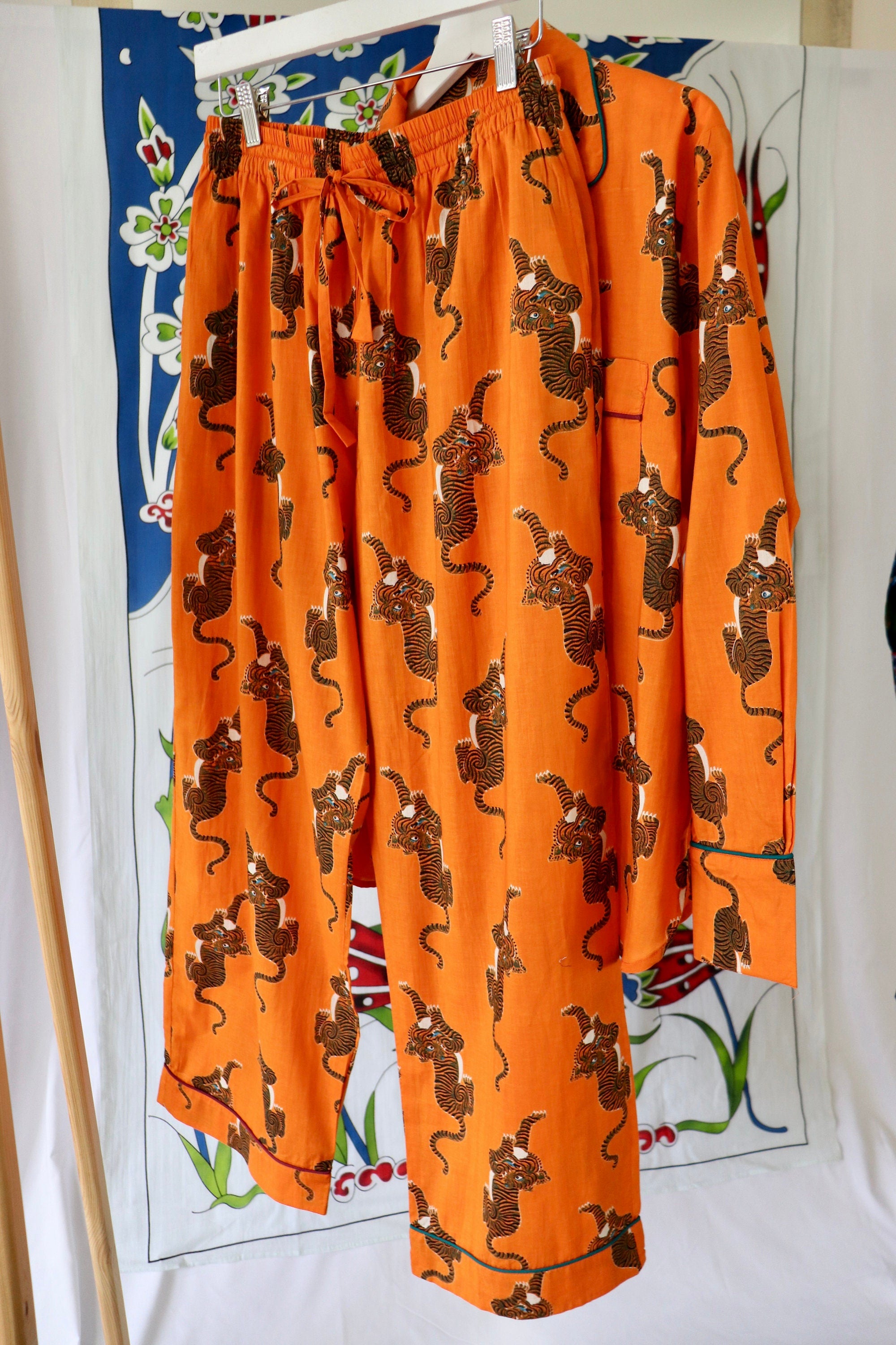 Pyjama set woman in pure cotton Tigers inspired print,  long pants and long sleeves with pockets and pipping on a Hermes Orange