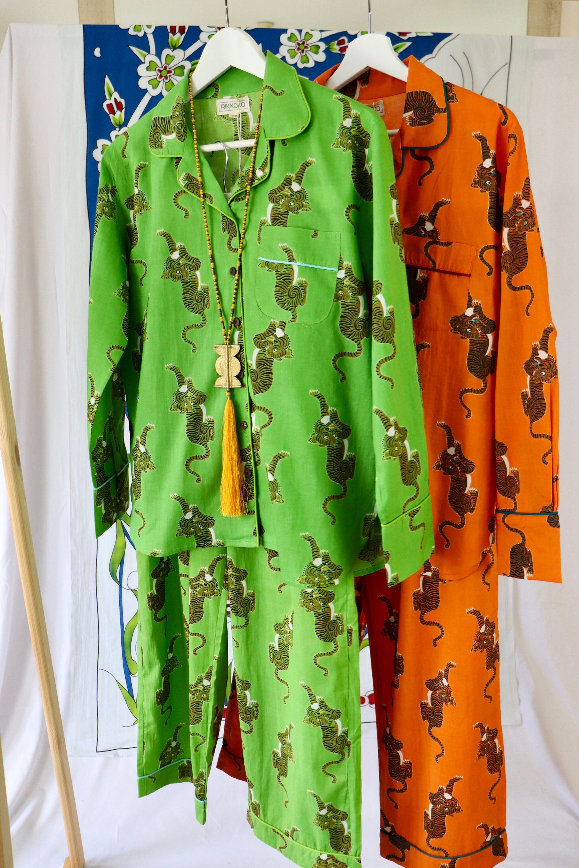 Pyjama set woman in pure cotton Tigers inspired print,  long pants and long sleeves with pockets and pipping on a Hermes Orange